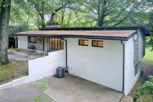 a front view of a house with a porch