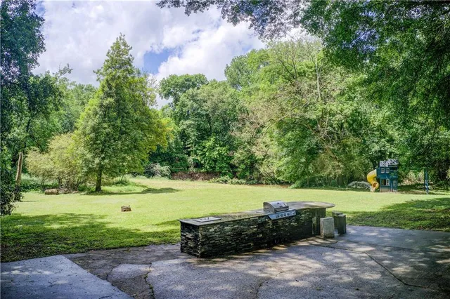 a view of a garden with an outdoor space