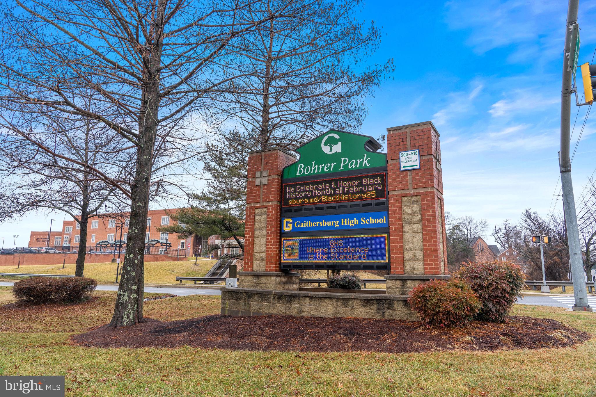 18521 Boysenberry Drive, Unit 242172 Gaithersburg, MD 20879 - Photo 39 of 43 a view of a house with a yard