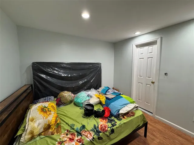 a room with toys and wooden floor