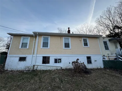 a house view with a backyard space