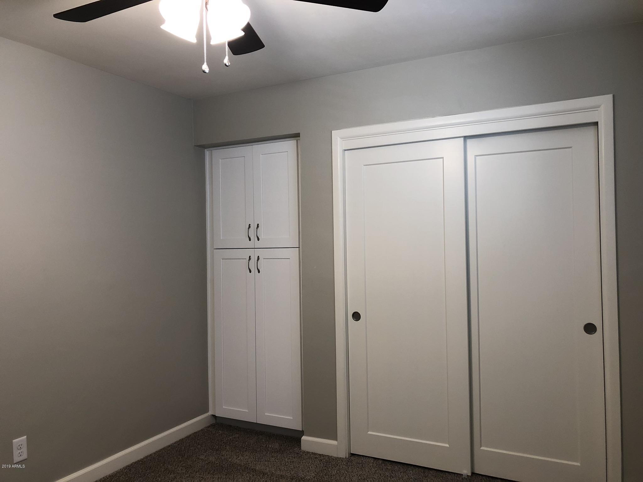 3715 West Lawrence Road Phoenix, AZ 85019 - Photo 14 of 24 Bedroom/Built In Cabinet