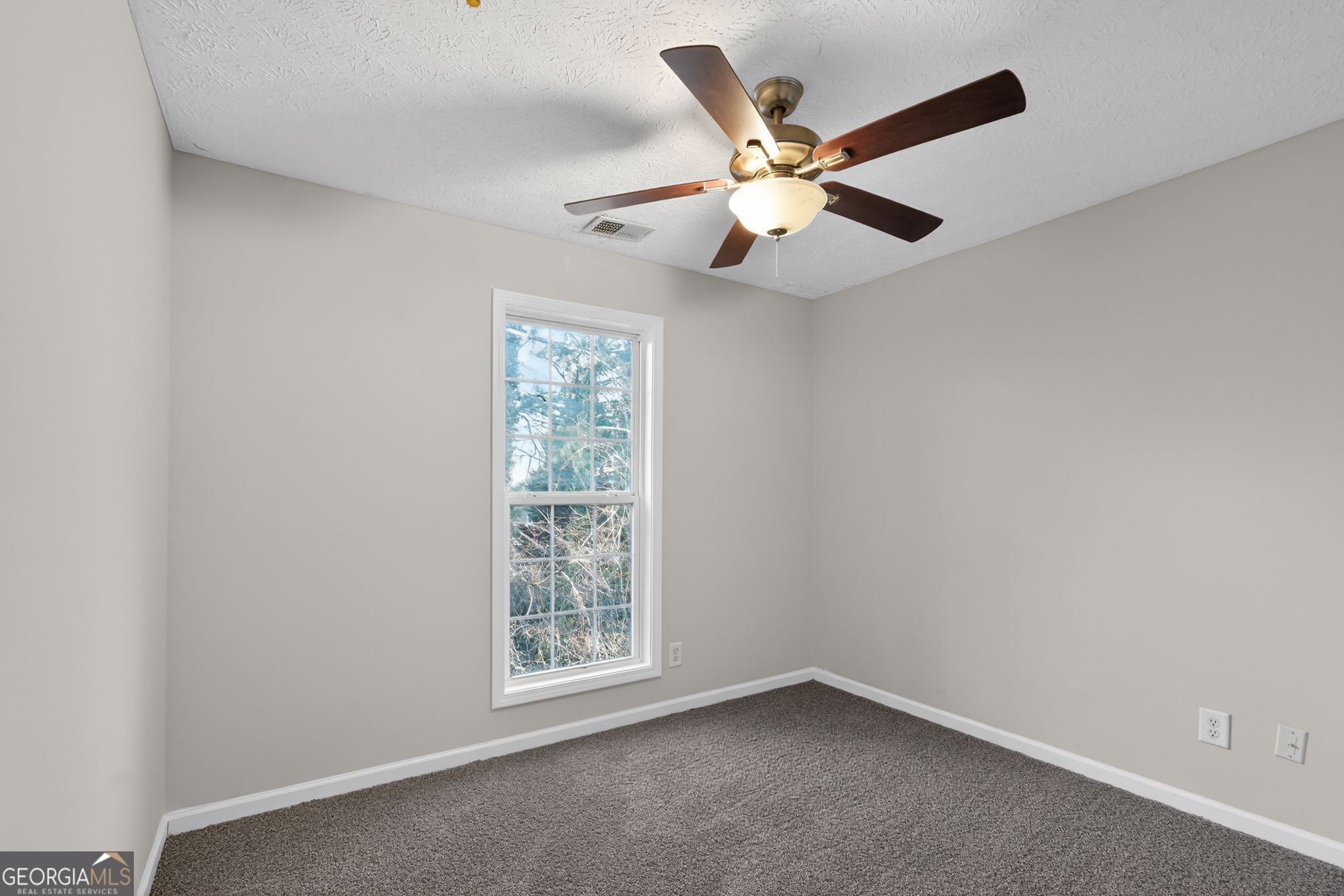 3969 Cress Way Run Decatur, GA 30034 - Photo 13 of 34 an empty room with windows and fan