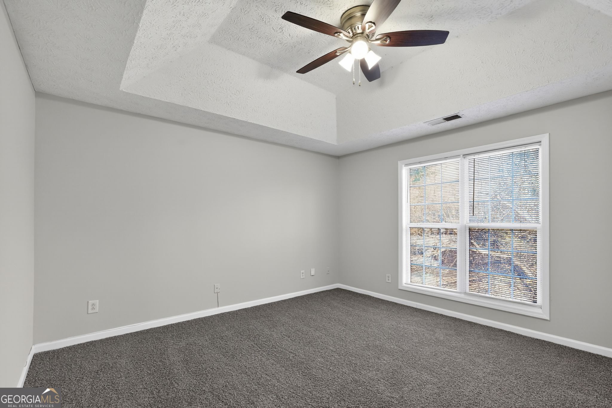 3969 Cress Way Run Decatur, GA 30034 - Photo 14 of 34 an empty room with a window and a fan