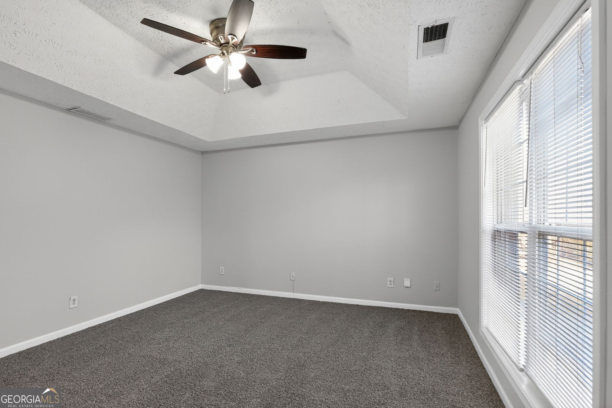 3969 Cress Way Run Decatur, GA 30034 - Photo 15 of 34 an empty room with a window and a fan