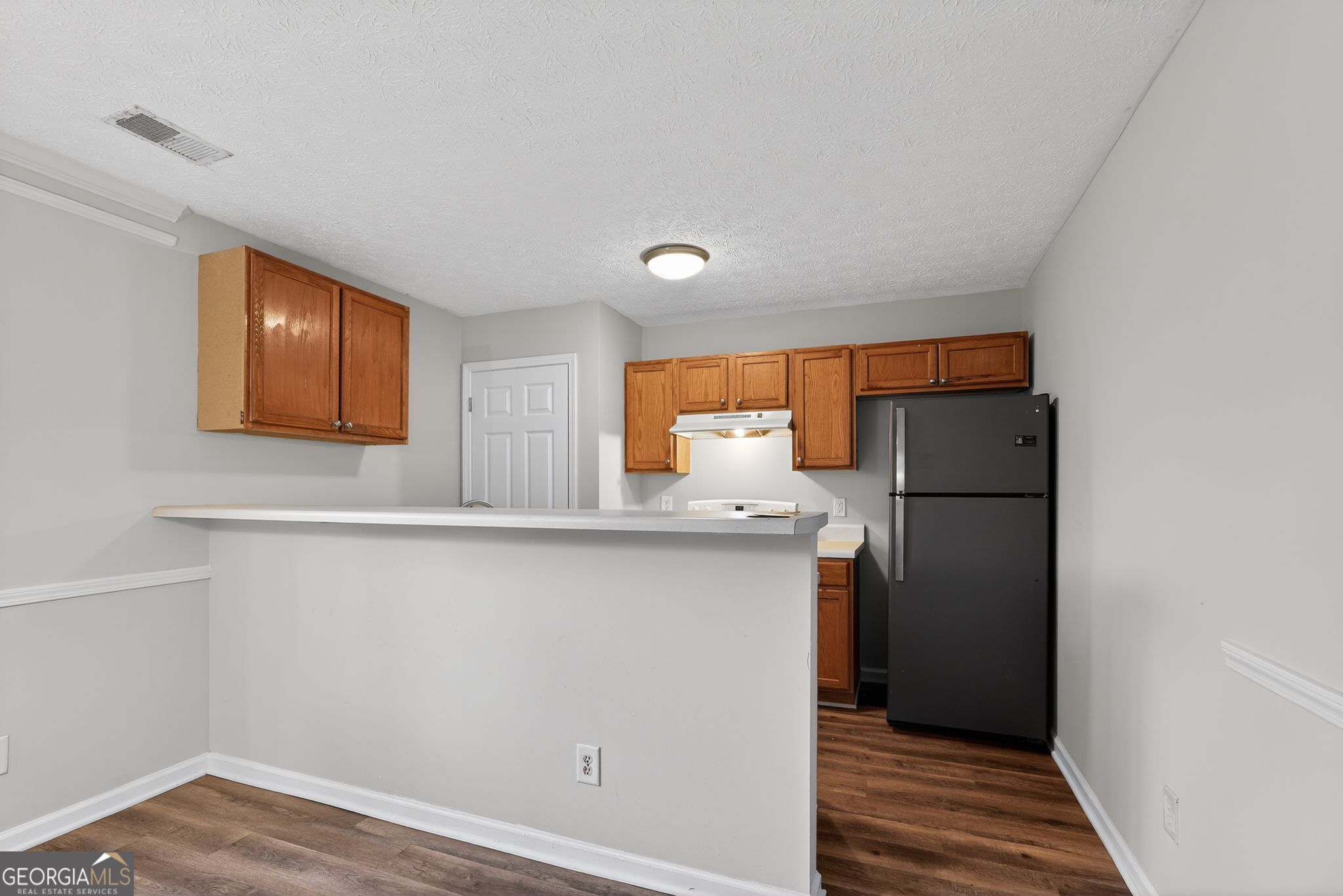 3969 Cress Way Run Decatur, GA 30034 - Photo 16 of 34 a kitchen with stainless steel appliances a refrigerator and microwave
