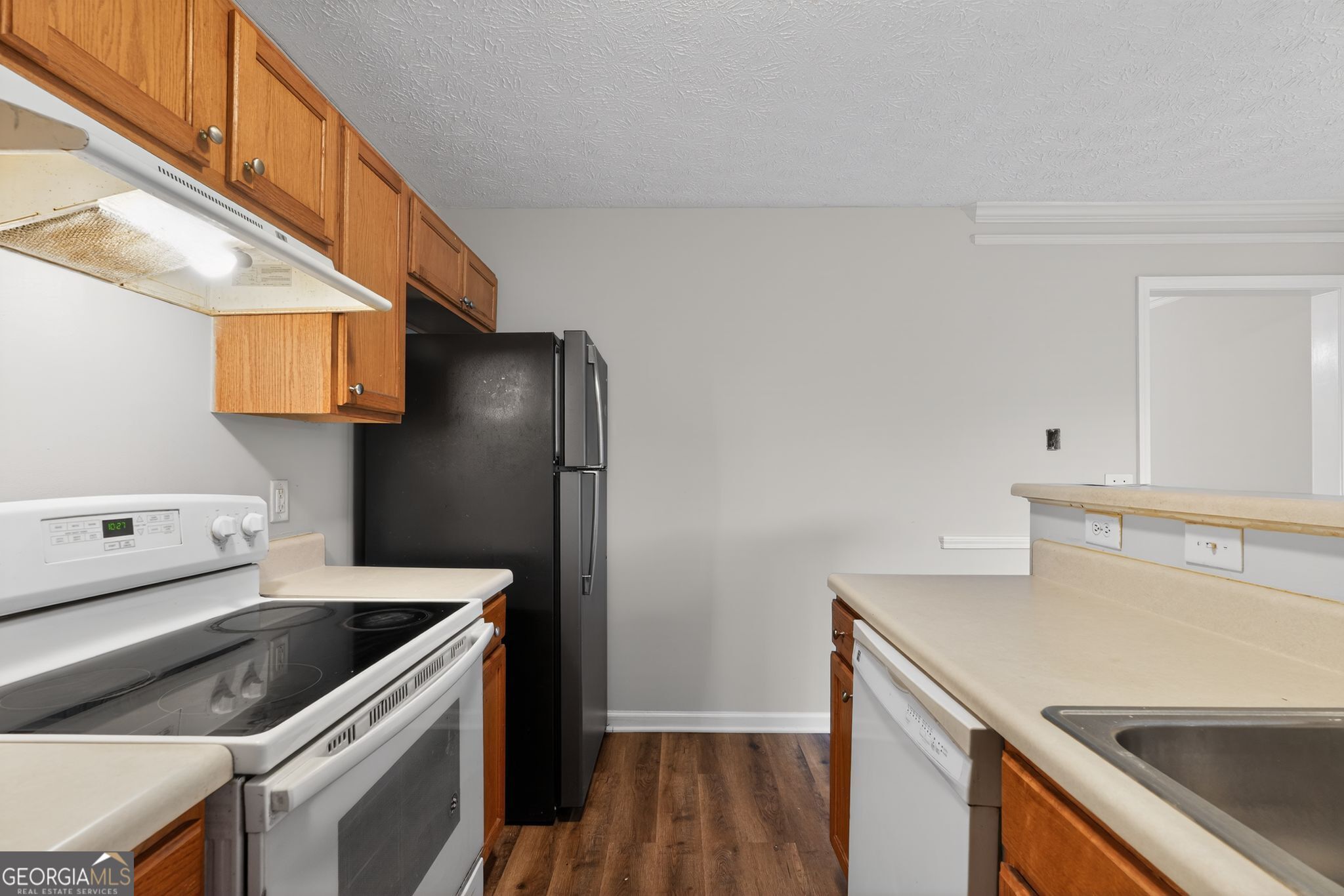 3969 Cress Way Run Decatur, GA 30034 - Photo 18 of 34 a kitchen with a sink a refrigerator and cabinets