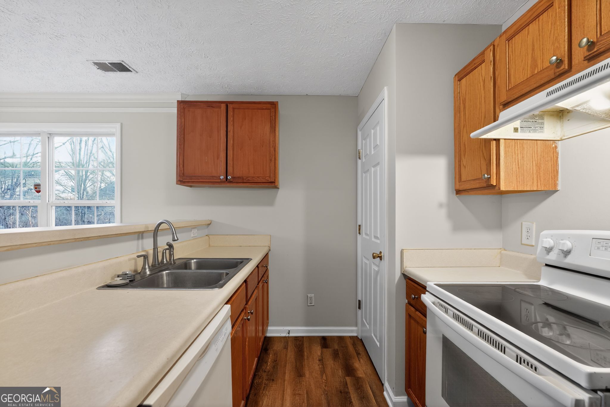 3969 Cress Way Run Decatur, GA 30034 - Photo 19 of 34 a kitchen that has a sink and a stove