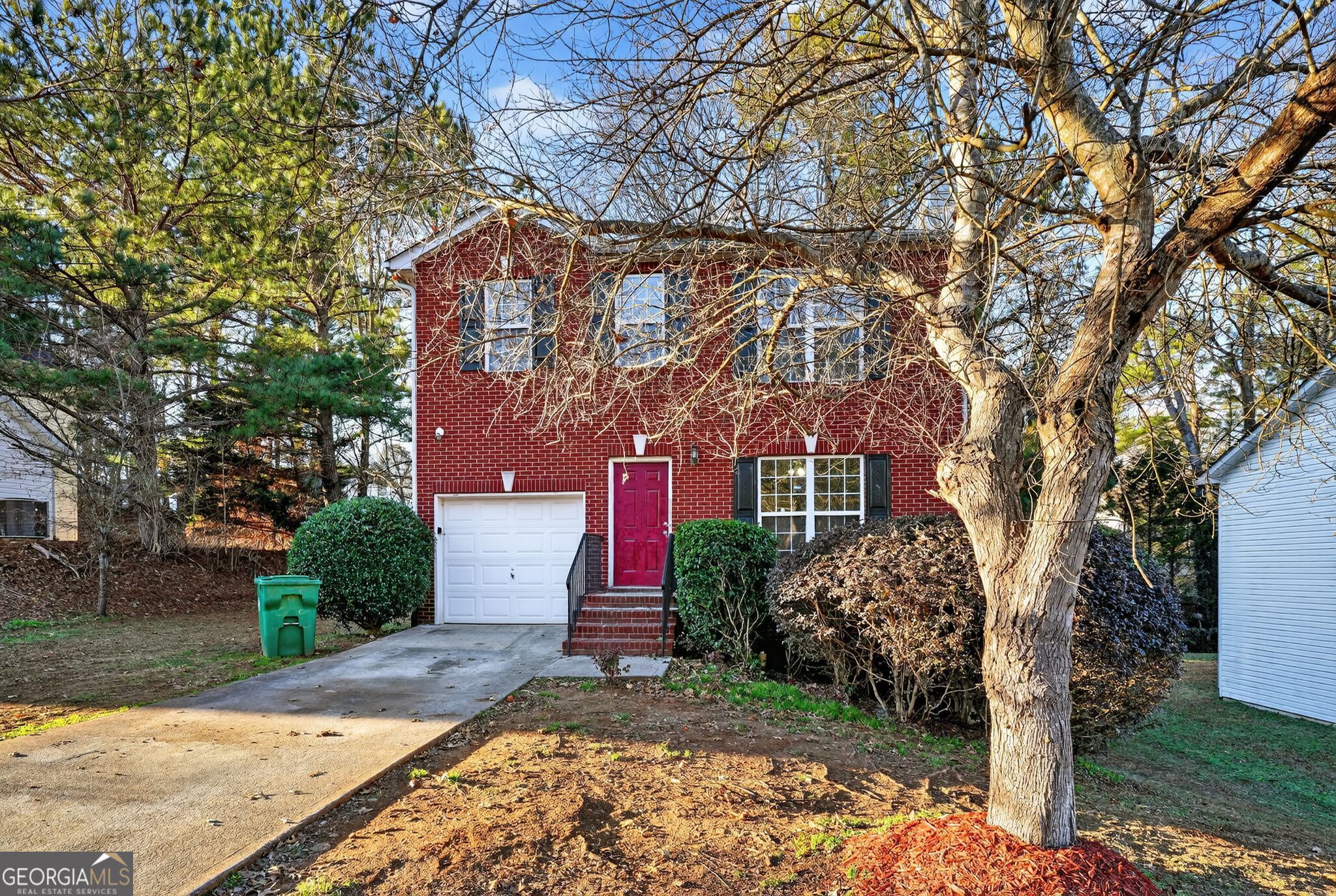 3969 Cress Way Run Decatur, GA 30034 - Photo 2 of 34 a front view of a house with garden