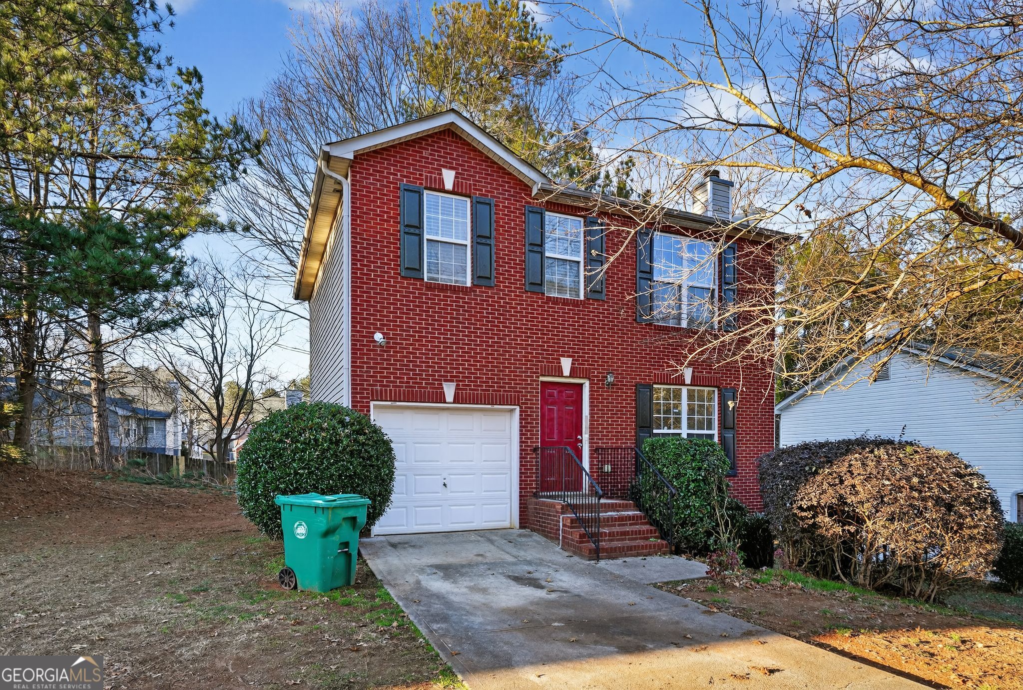 3969 Cress Way Run Decatur, GA 30034 - Photo 3 of 34 a front view of a house with garden
