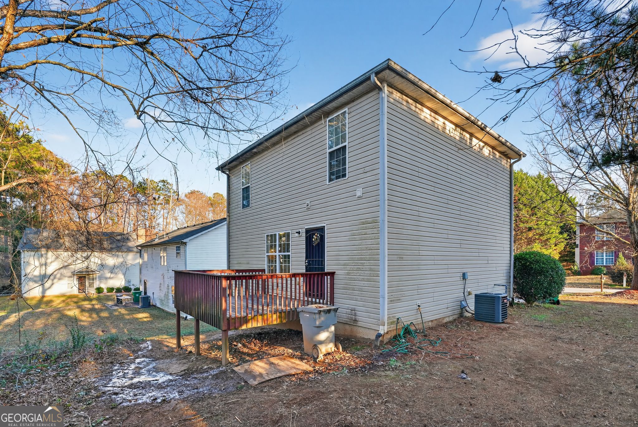 3969 Cress Way Run Decatur, GA 30034 - Photo 4 of 34 a backyard of a house with barbeque oven table and chairs