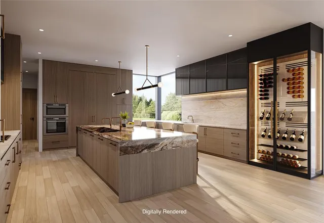 a kitchen with stainless steel appliances granite countertop a stove and a refrigerator