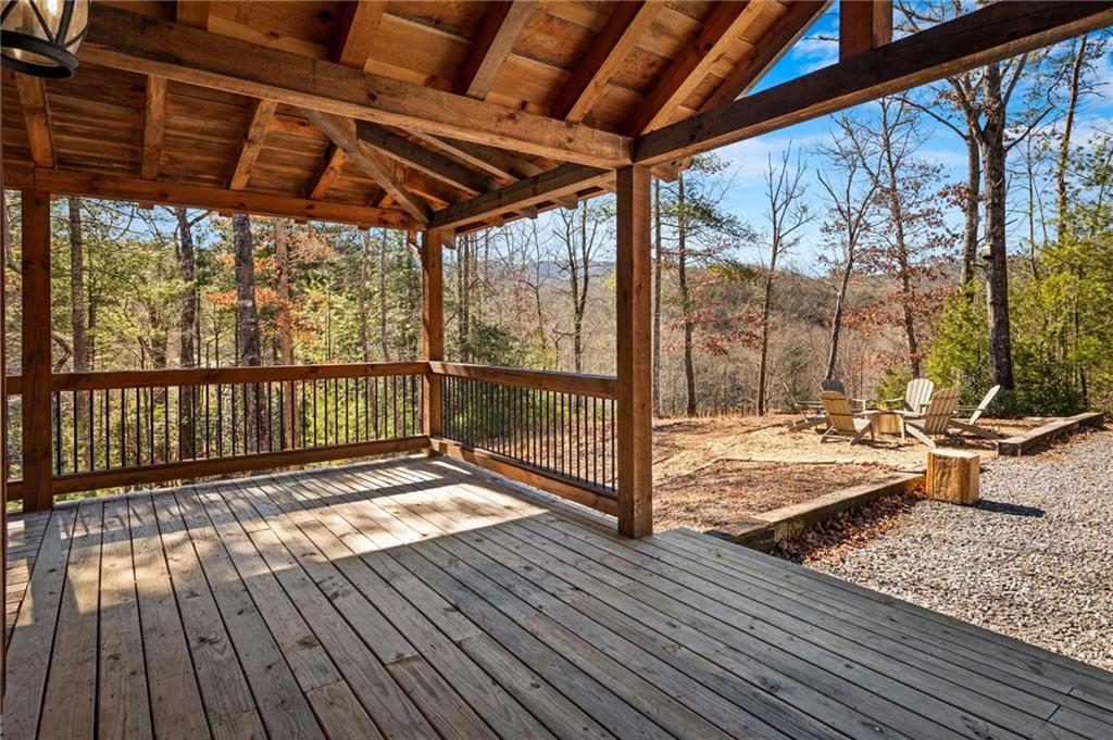 155 Peppermint Lane Epworth, GA 30541 - Photo 7 of 61 a view of a balcony with wooden floor