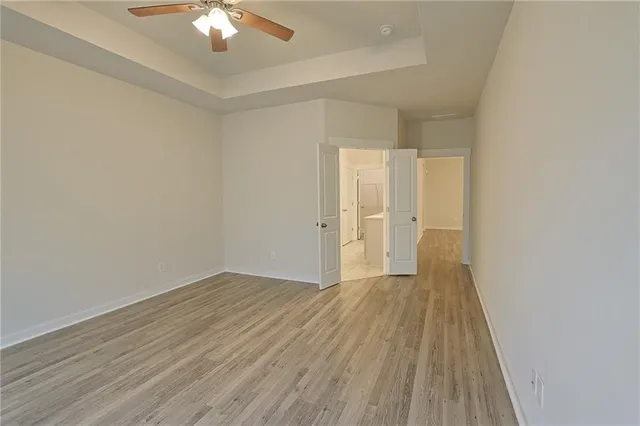 a bathroom with a sink vanity granite shower and a mirror