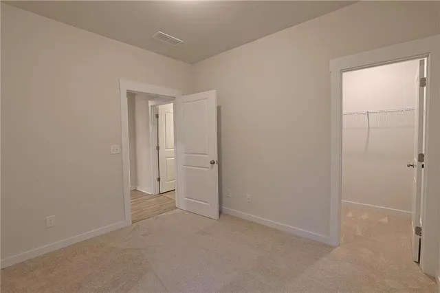 a bathroom with a sink double vanity and a mirror