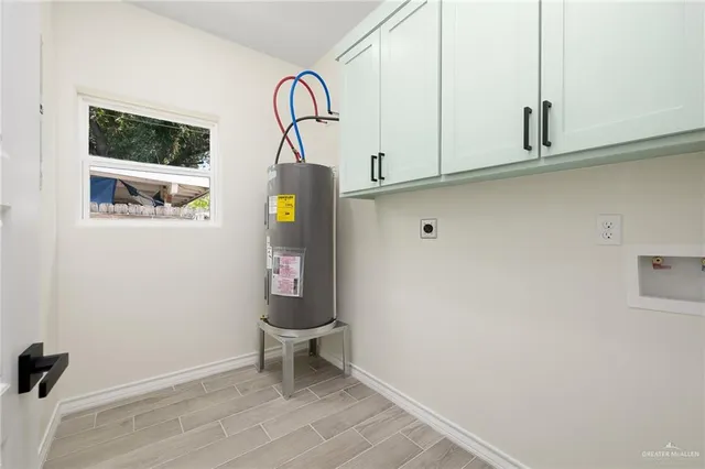 a view of a room with rack and wooden floor