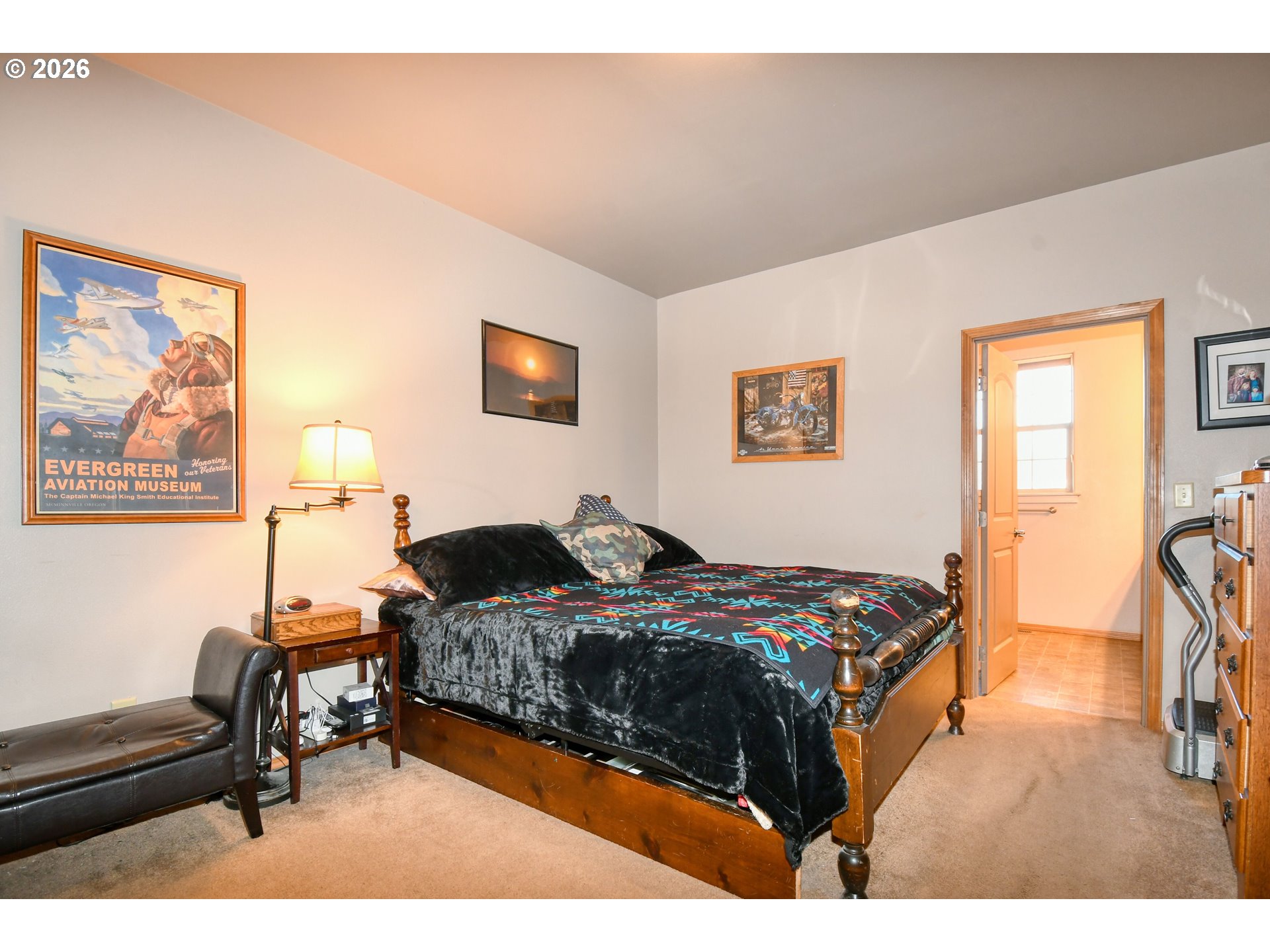 2175 Northwest Gilliam Avenue Pendleton, OR 97801 - Photo 15 of 36 a bedroom with a bed and wooden floor