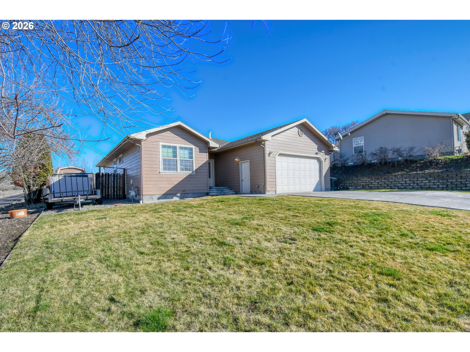 2175 Northwest Gilliam Avenue Pendleton, OR 97801 - Photo 2 of 36 a view of house with backyard and garden