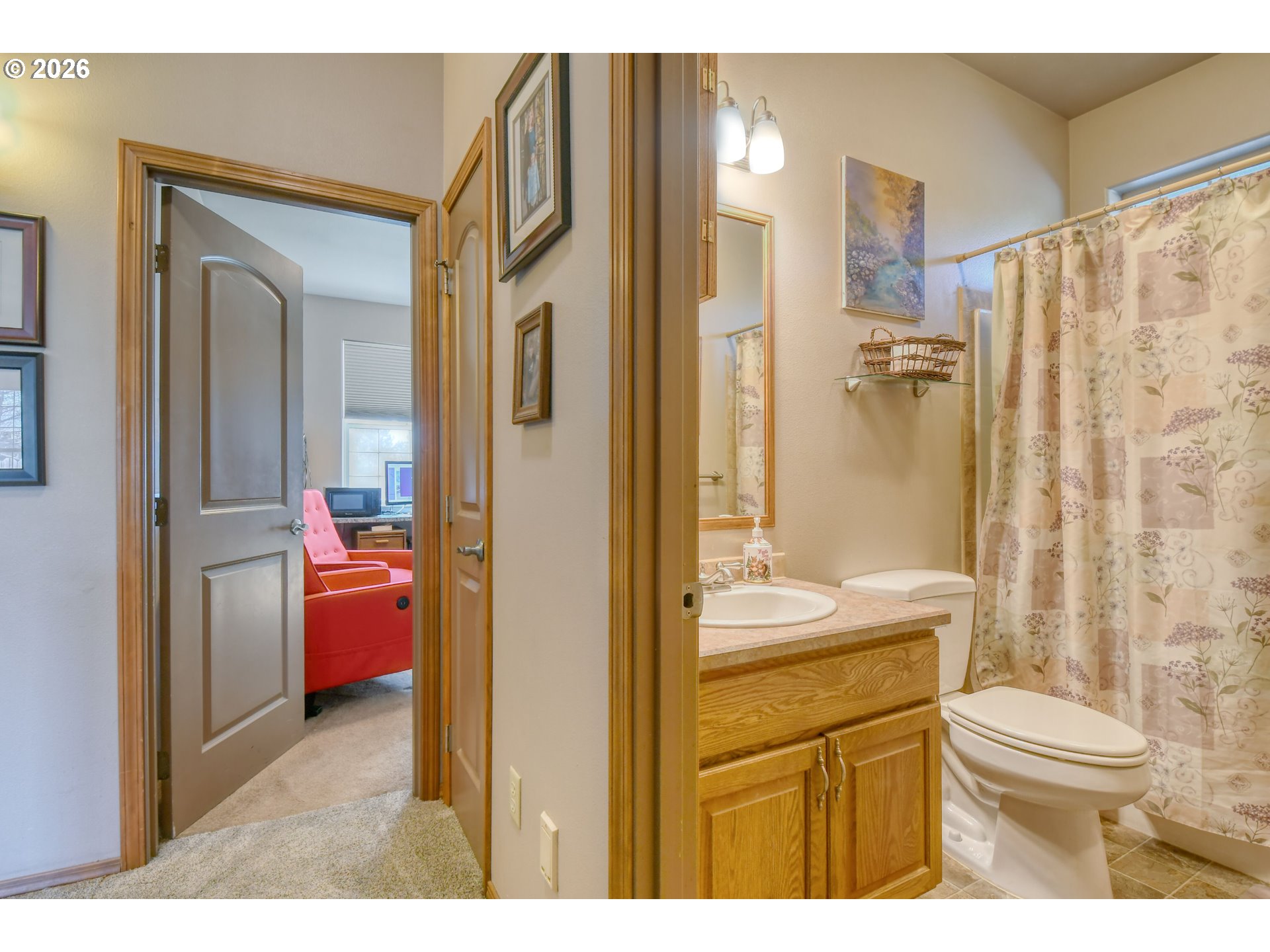 2175 Northwest Gilliam Avenue Pendleton, OR 97801 - Photo 21 of 36 a bathroom with a sink a toilet and a shower