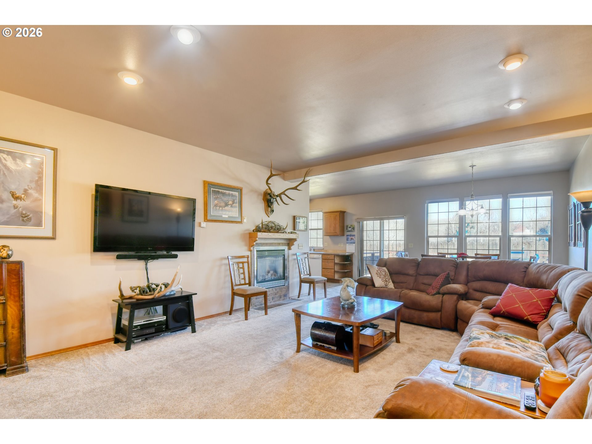 2175 Northwest Gilliam Avenue Pendleton, OR 97801 - Photo 7 of 36 a living room with furniture and a flat screen tv