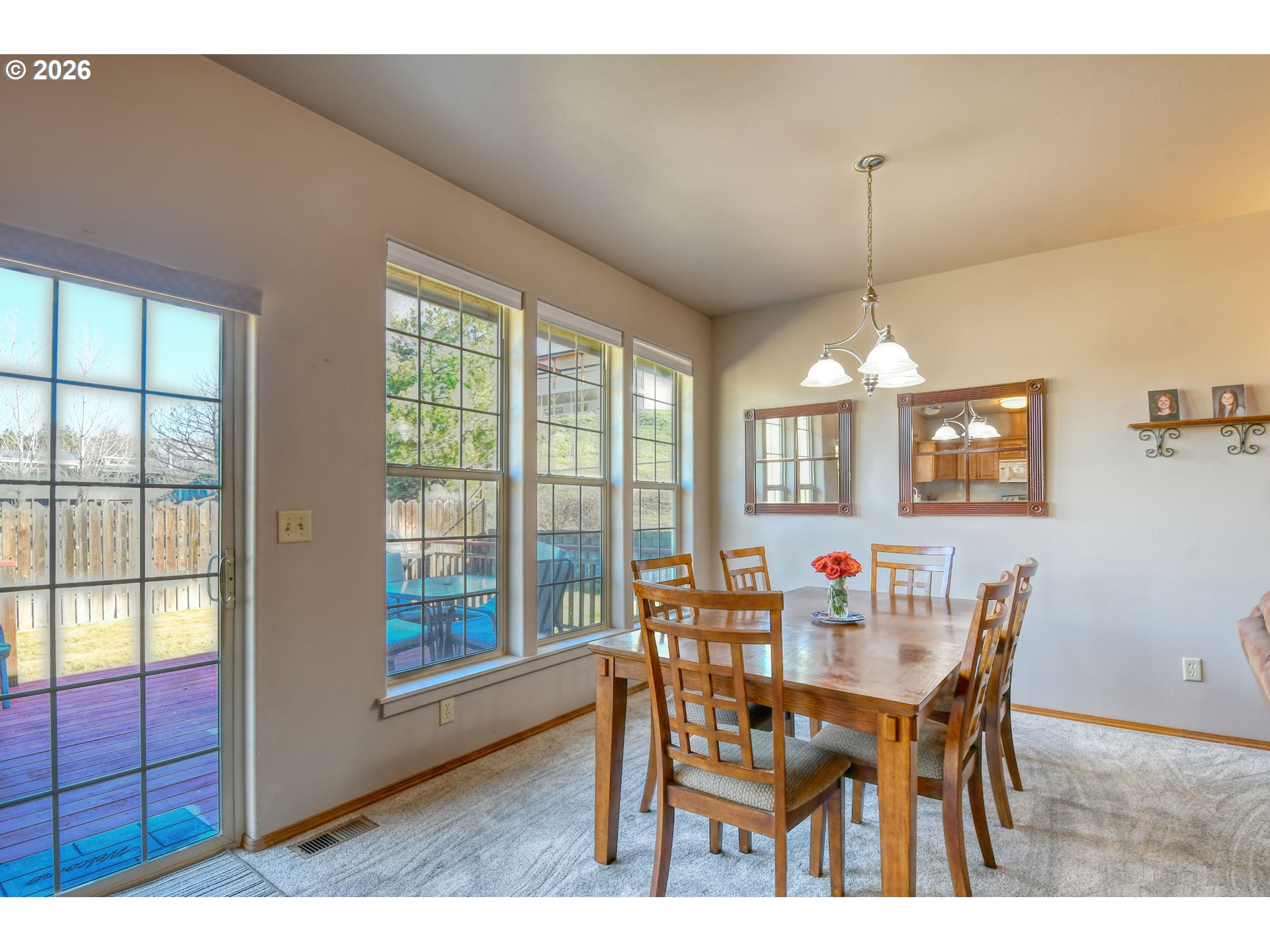 2175 Northwest Gilliam Avenue Pendleton, OR 97801 - Photo 10 of 36 a view of a dining room with furniture window and wooden floor