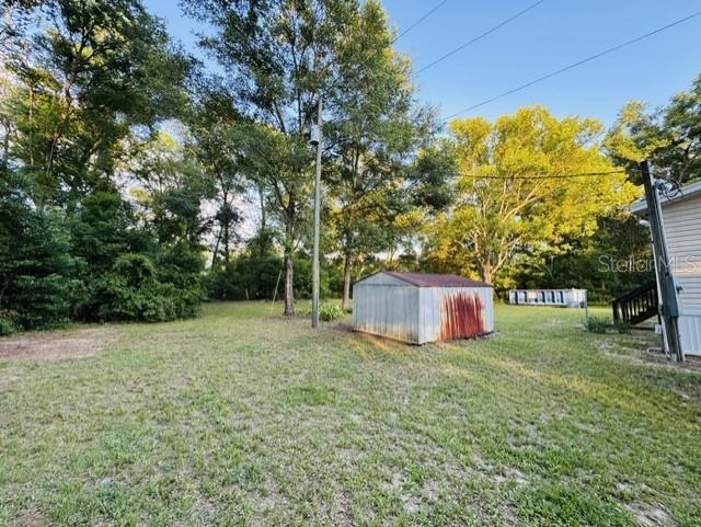 11817 Southwest 58th Street Webster, FL 33597 - Photo 37 of 46 a view of a backyard