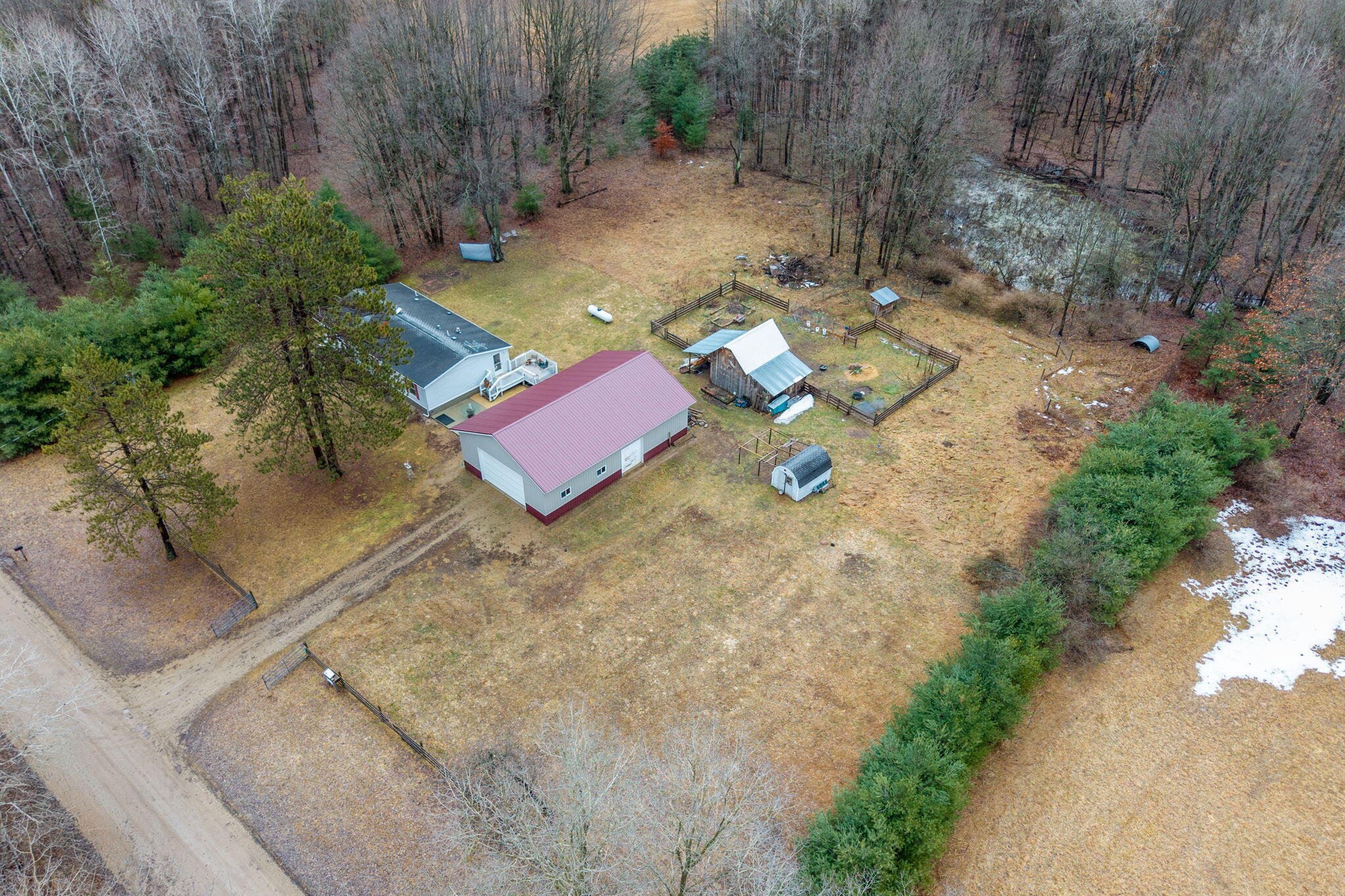 9433 8 Mile Road Mecosta, MI 49332 - Photo 44 of 54 44-web-or-mls-DJI_20260308000410_0073_D-