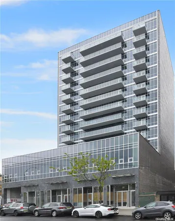 a front view of a building with a street