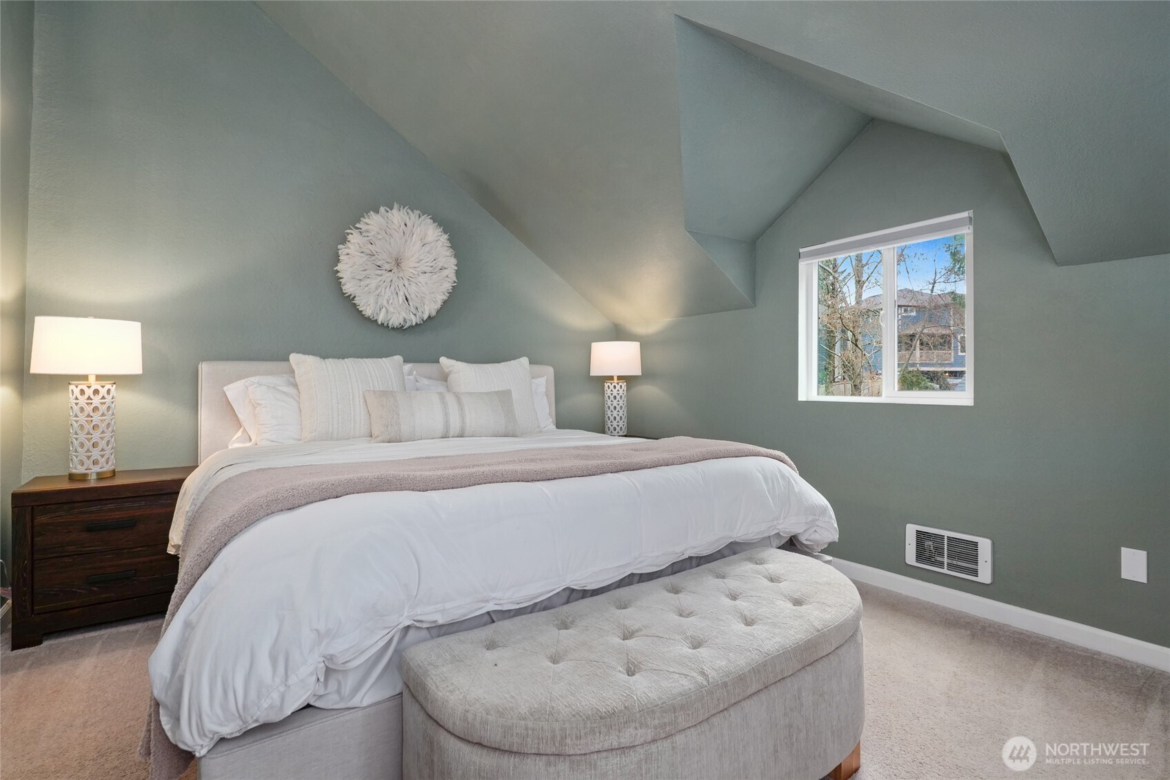 19922 3rd Drive Southeast Bothell, WA 98012 - Photo 15 of 30 a bedroom with a bed and a chandelier