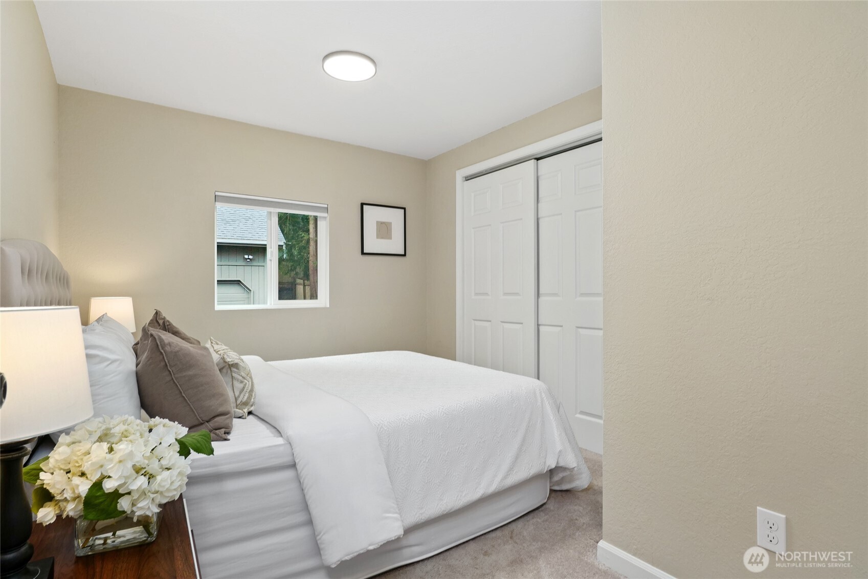 19922 3rd Drive Southeast Bothell, WA 98012 - Photo 10 of 30 a bedroom with a bed table and a couch