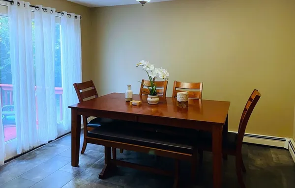 a view of a workspace with furniture