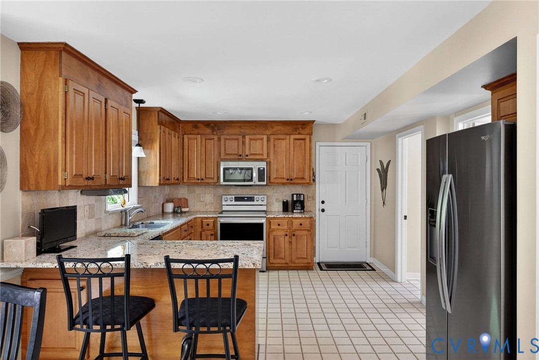 5404 Rock Harbour Road Midlothian, VA 23112 - Photo 17 of 69 Kitchen has breakfast bar & 2 pantries!