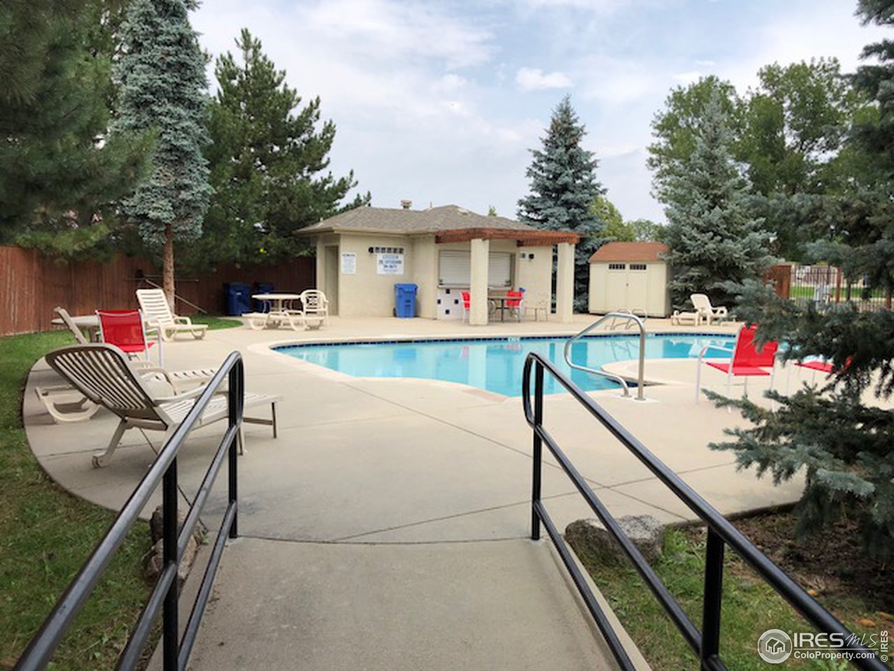 513 Ridgeview Drive Louisville, CO 80027 - Photo 25 of 25 Neighborhood pool Photo credit: Homestead Mgmt