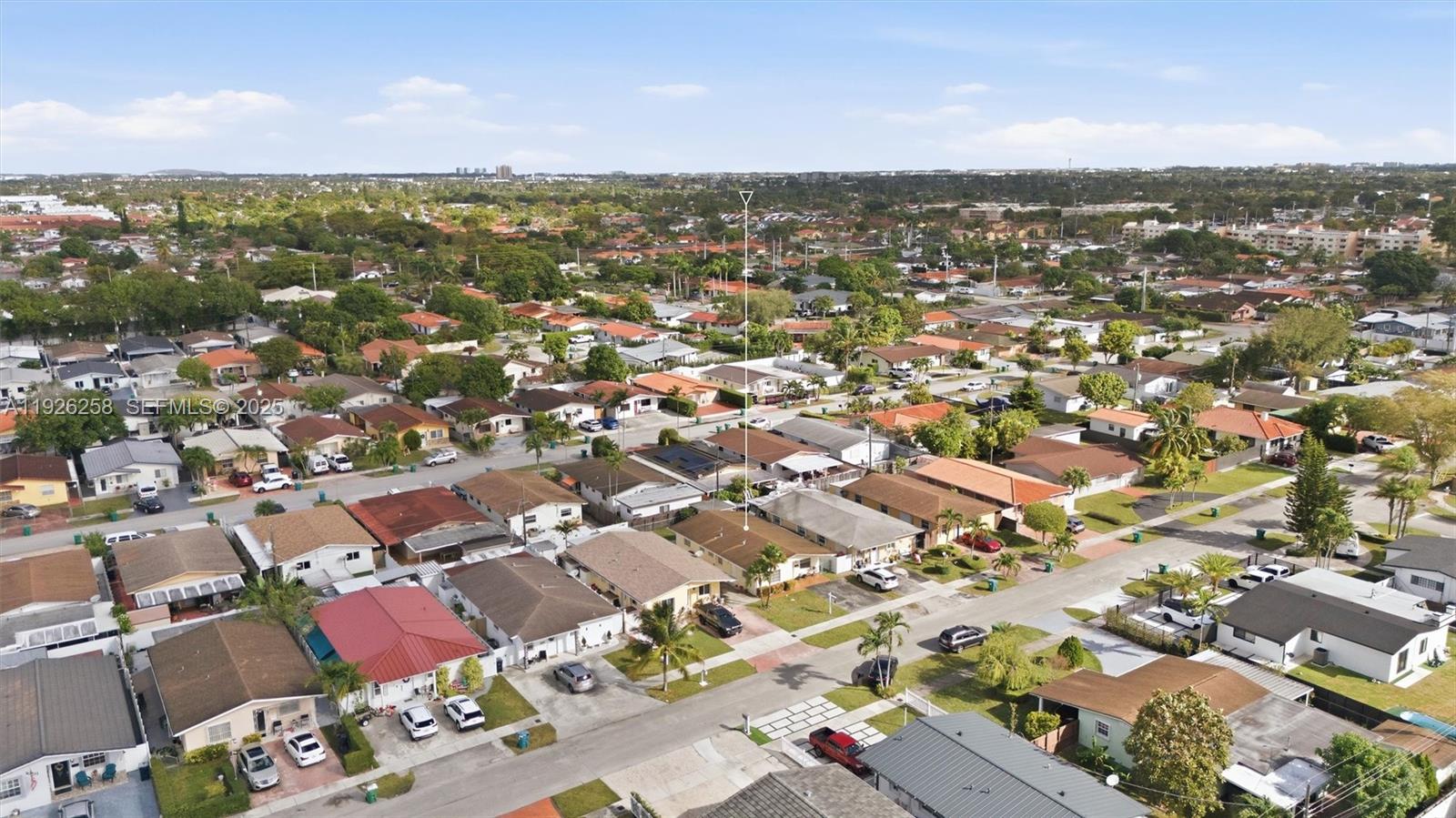 10551 Southwest 27th Street Miami, FL 33165 - Photo 24 of 35 an aerial view of residential houses with city view