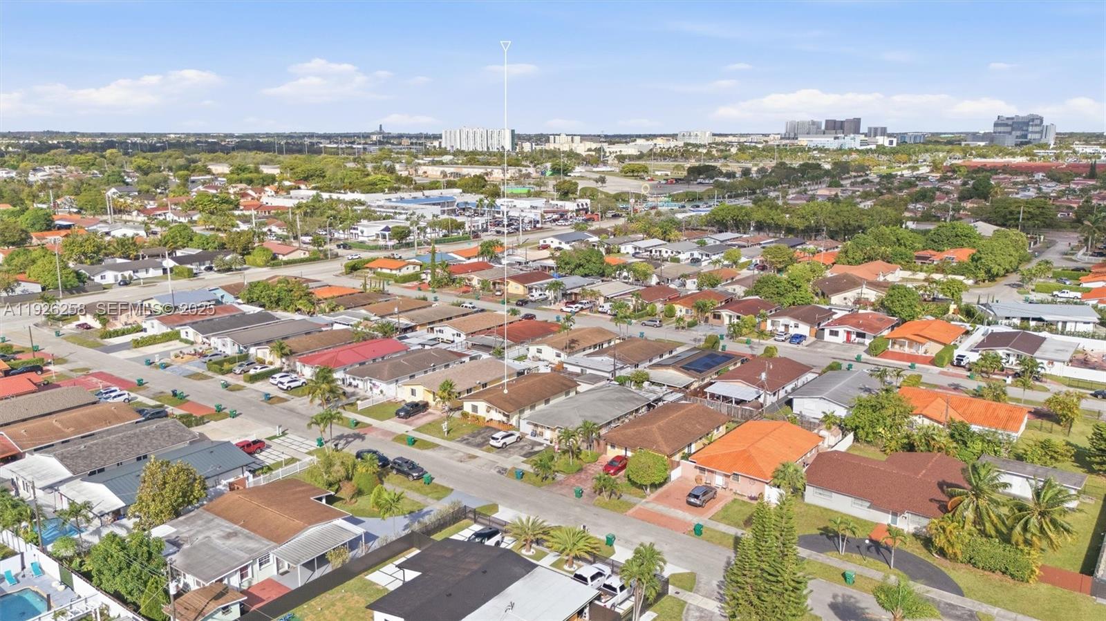 10551 Southwest 27th Street Miami, FL 33165 - Photo 25 of 35 an aerial view of residential building with parking space