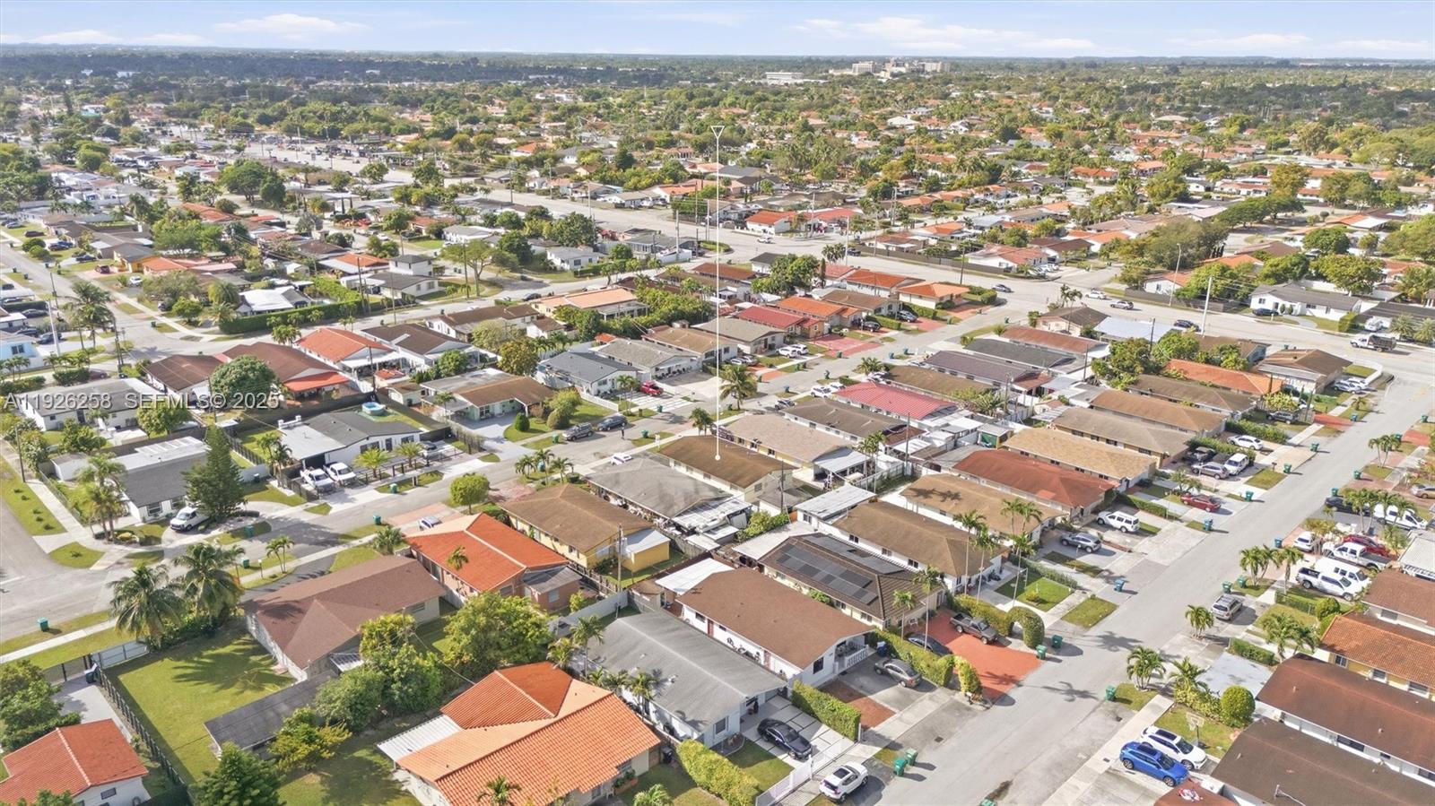 10551 Southwest 27th Street Miami, FL 33165 - Photo 26 of 35 an aerial view of residential houses with outdoor space