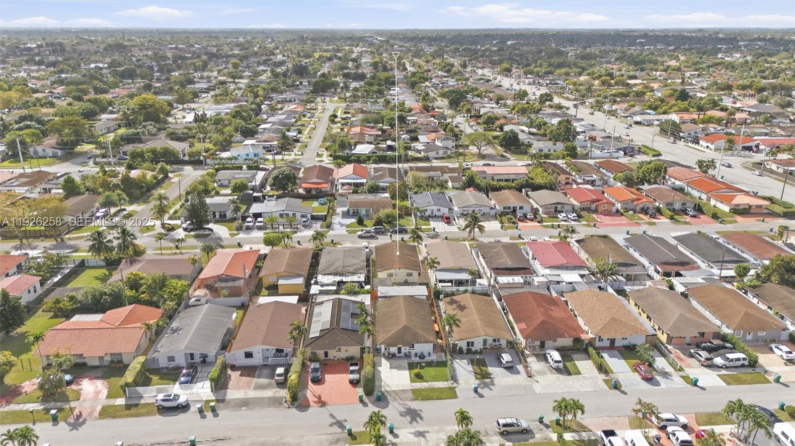 10551 Southwest 27th Street Miami, FL 33165 - Photo 27 of 35 an aerial view of residential houses with city view