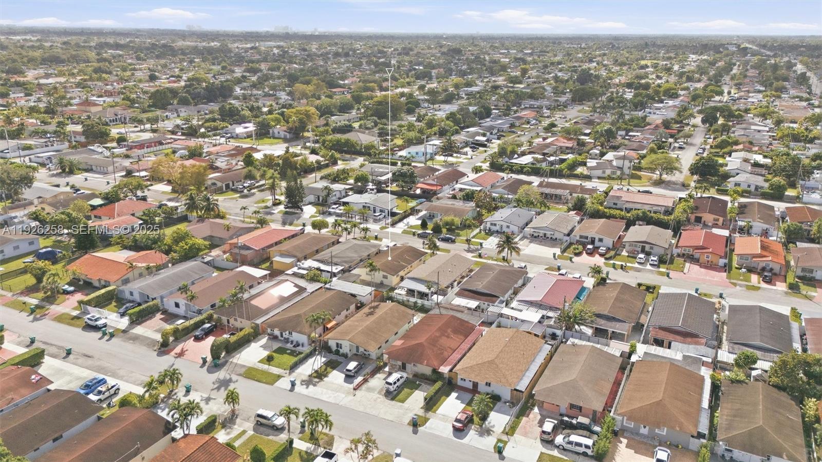 10551 Southwest 27th Street Miami, FL 33165 - Photo 28 of 35 an aerial view of residential houses with city view