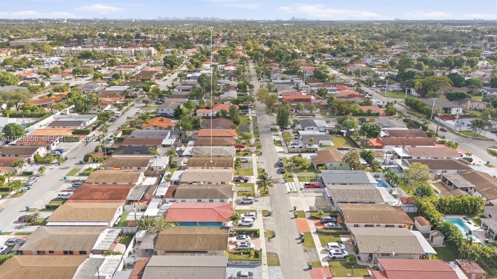 10551 Southwest 27th Street Miami, FL 33165 - Photo 29 of 35 an aerial view of residential houses with city view