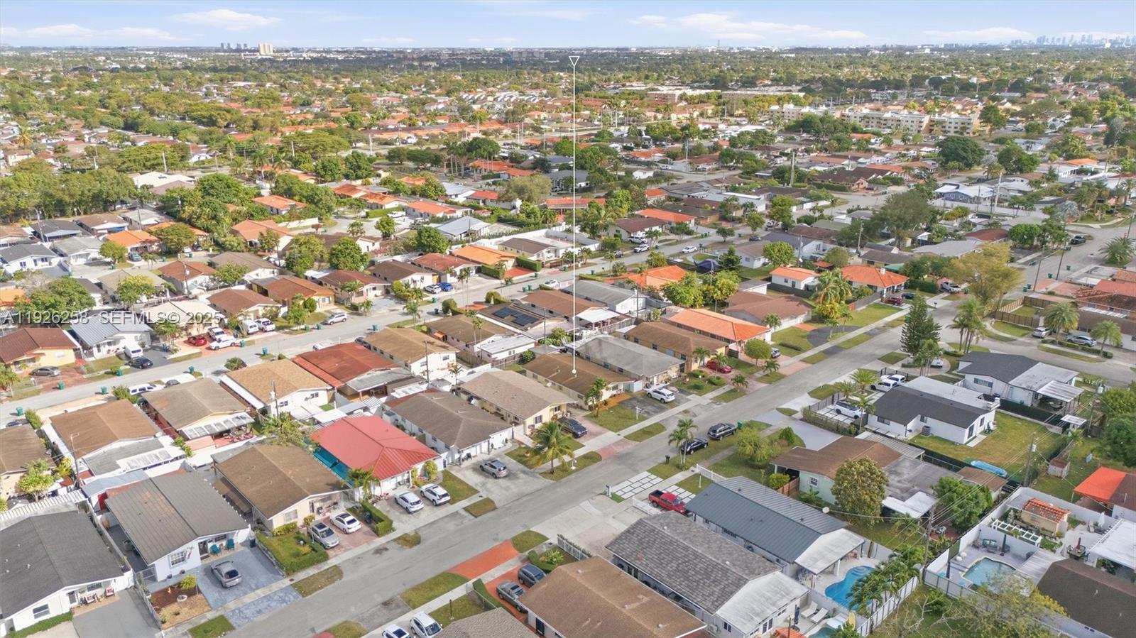 10551 Southwest 27th Street Miami, FL 33165 - Photo 30 of 35 an aerial view of residential houses with outdoor space