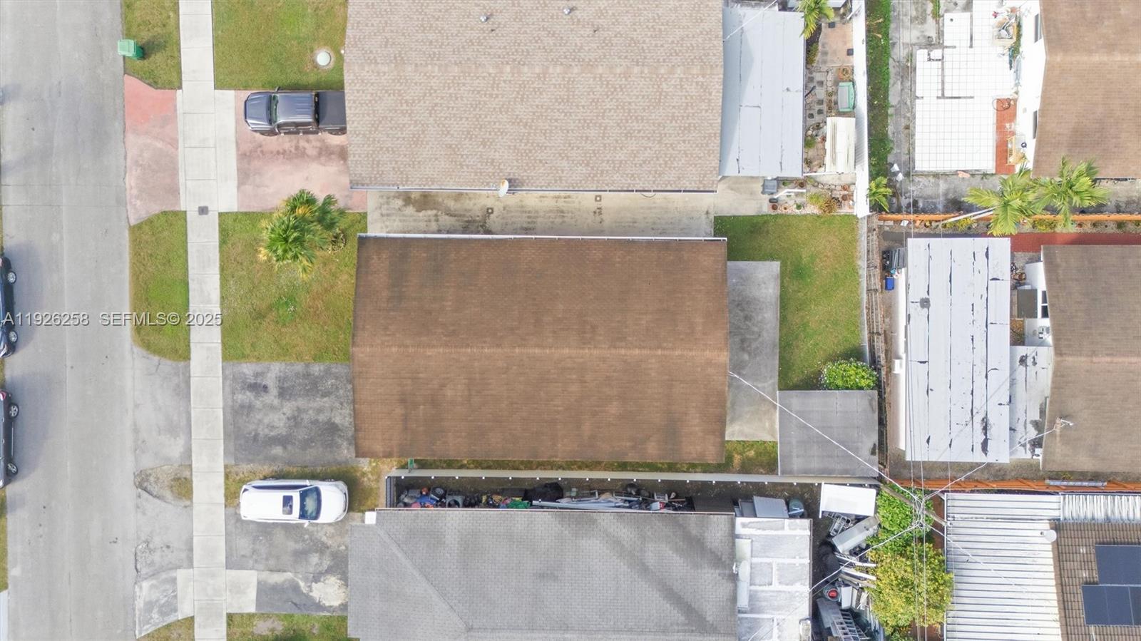 10551 Southwest 27th Street Miami, FL 33165 - Photo 33 of 35 a bathroom with a granite countertop shower and a sink