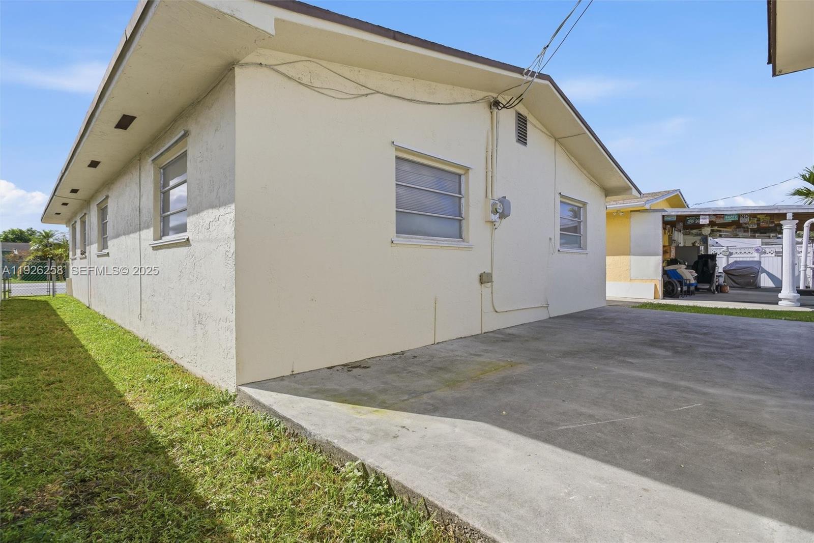 10551 Southwest 27th Street Miami, FL 33165 - Photo 7 of 35 a view of a street with a house