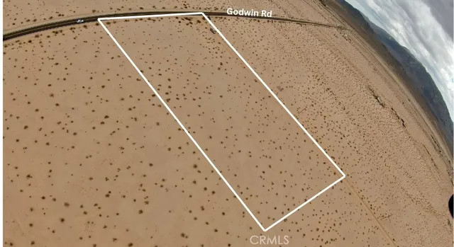 a view of a balcony with wooden floor