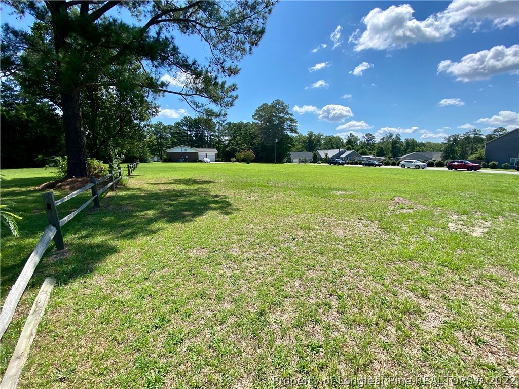 Tbd Lindsay Road Fayetteville, NC 28304 - Photo 1 of 2 a view of a building with big yard