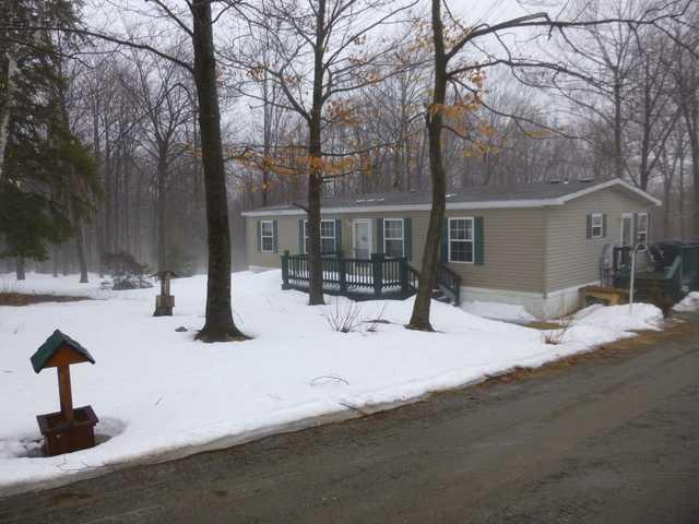 1833 Industry Road Industry, ME 04938 - Photo 9 of 22 Exterior Front.