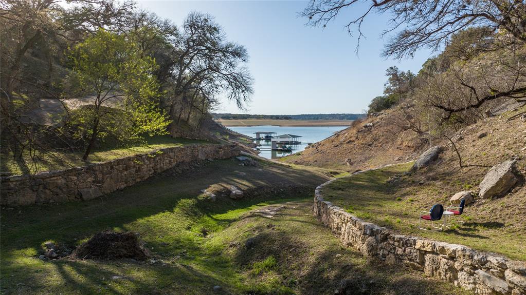 5255 Lookout Ridge Drive Marble Falls, TX 78654 - Photo 14 of 40 Lot bottom terrace on right, and Lake Travis access cove shoreline