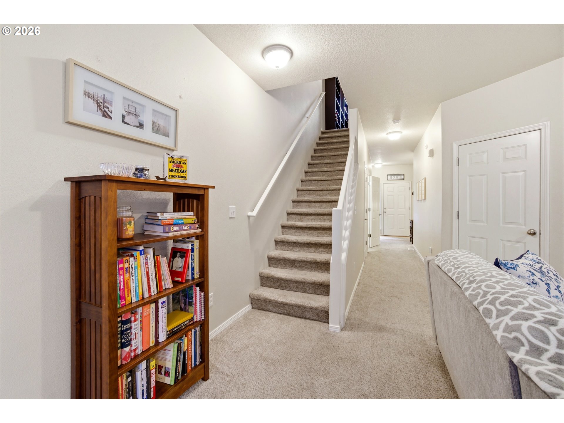 7159 Southwest Millennium Terrace Beaverton, OR 97007 - Photo 11 of 24 a view of a bedroom with furniture and staircase