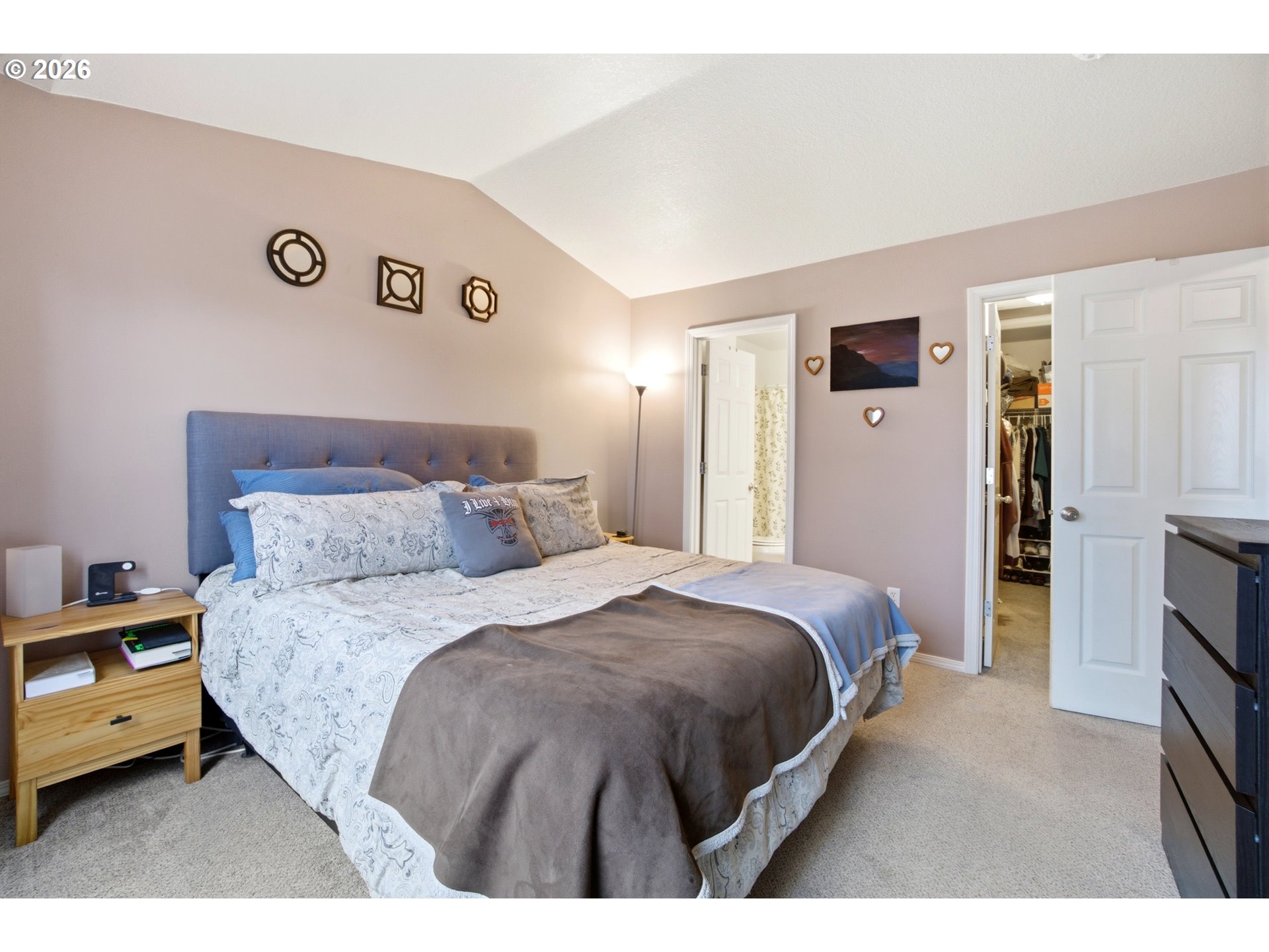 7159 Southwest Millennium Terrace Beaverton, OR 97007 - Photo 14 of 24 a bedroom with a bed and a tv