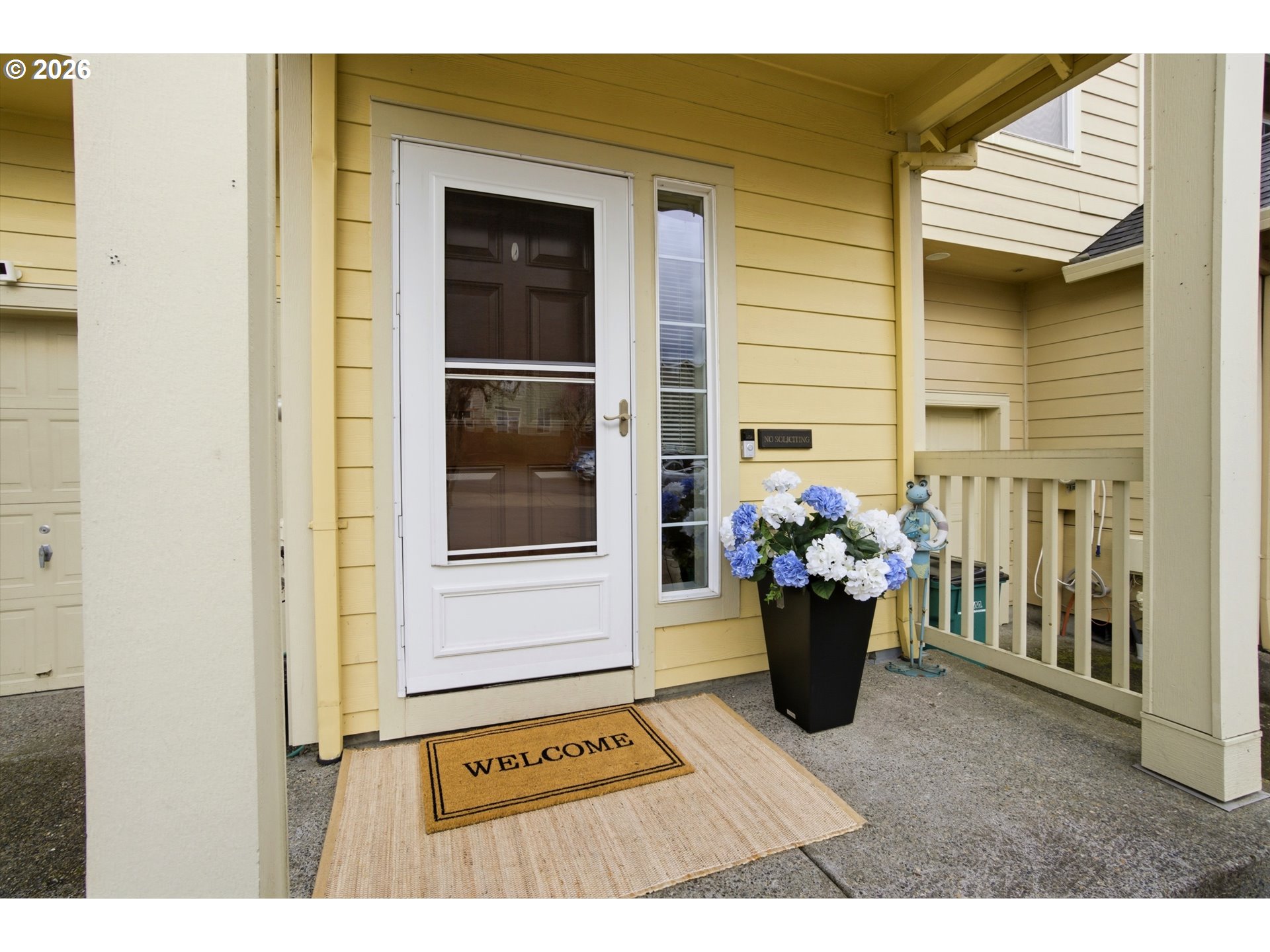 7159 Southwest Millennium Terrace Beaverton, OR 97007 - Photo 2 of 24 a view of a porch with a chair