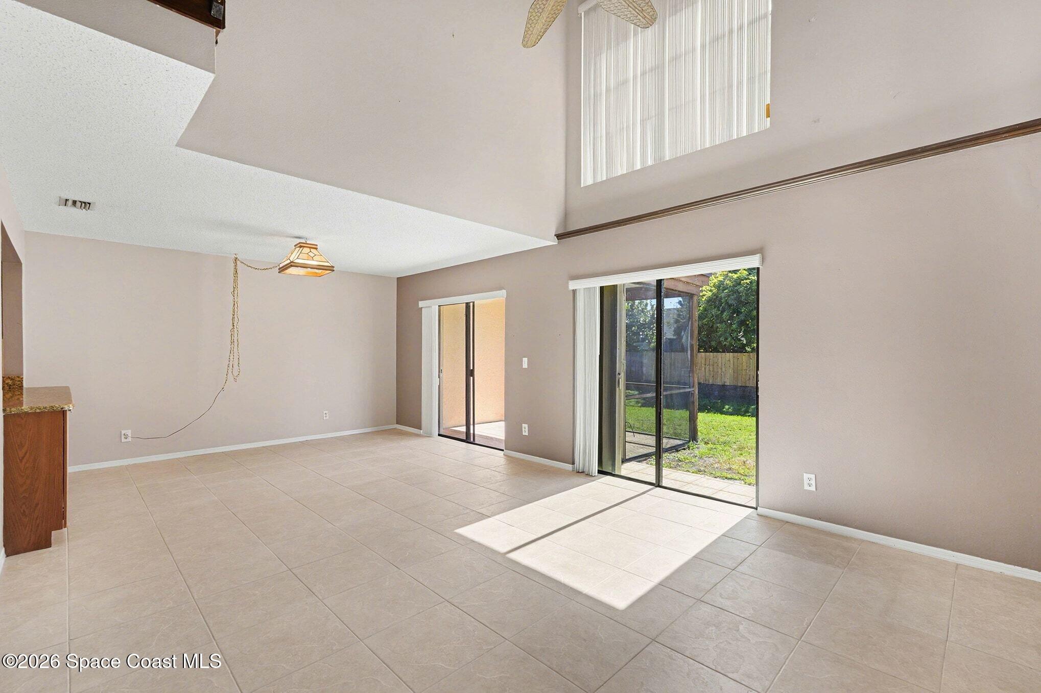 2653 Elliot Way, Unit 6 Melbourne, FL 32935 - Photo 4 of 30 a view of an empty room with a window